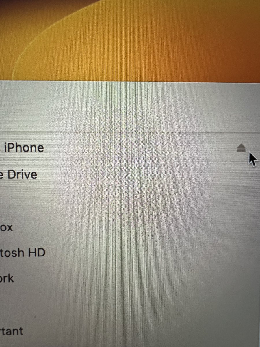 ProfAndyDong's tweet photo. I doubt I need to press the Eject button to disconnect my iPhone, but I think it's nice that they still have that symbol for those who remember the "blue screen of death" or similar when you didn't ask the operating system for permission to remove a device. https://t.co/jAjXvcmKGt