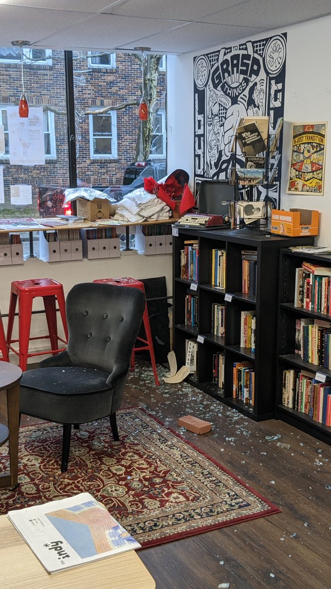 RedInkPVD's tweet image. HATRED STRIKES AGAIN! Last night an anti-communist message was sent to us in anticipation of our Red Books Day celebration of the publication of the Communist Manifesto. Last year they showed up with flags to intimidate, this year they threw bricks through the window.