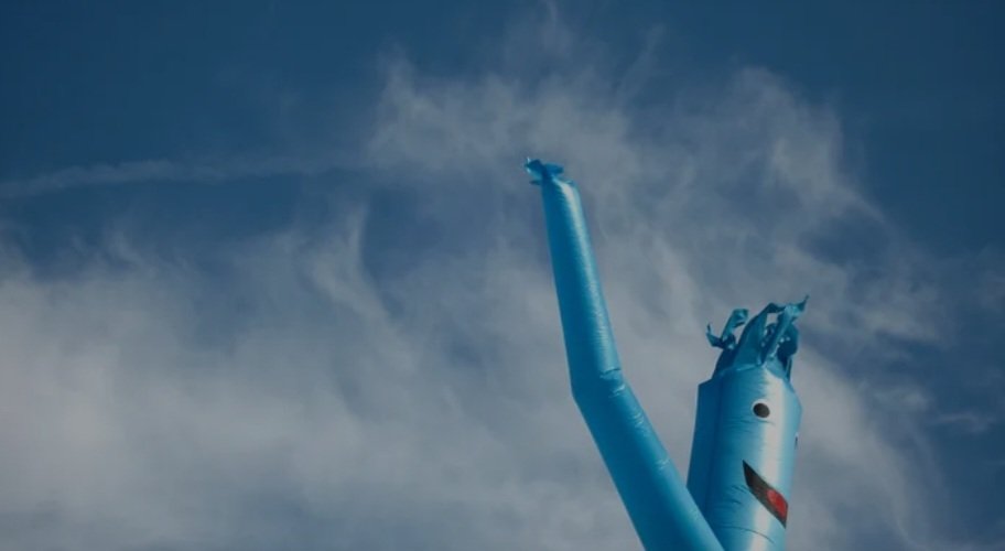 Exploration_NFT's tweet photo. Wacky waving inflatable arm flailing tube man spotted over used car dealership in Alaska https://t.co/RFkXH7FDmJ