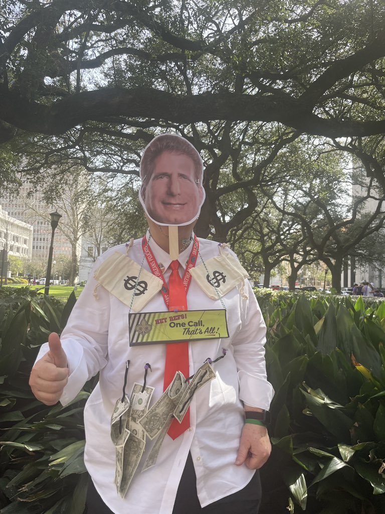 Ann Stephens is pictured behind the stands at Gallier Hall on the parade route in New Orleans dressed as injury attorney Morris Bart. She and six of her friends call themselves the 'Krewe of Injury Attorneys' and are all dressed as local lawyers, she said. @nolanews