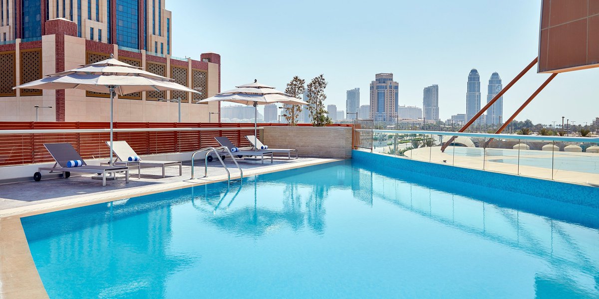 SLusail's tweet photo. The sun is up in the coming days! Take advantage of this lovely weather and dive into the pool as you relax and enjoy the Lusail city view. Head over to Staybridge Suites Doha Lusail and book with us now!

For more information, call us!
📞 +974 4456 5000
staybridge.doha@ihg.com https://t.co/4VTZWiP7TZ