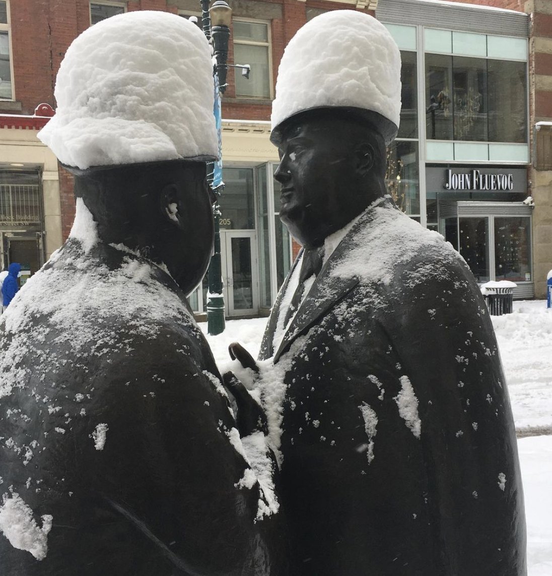 everydaytourist's tweet photo. DYK it has snowed in Calgary every month of the year except July, when we get hail storms? It is business as usual for these two guys no matter what the weather. #Calgary365 https://t.co/OUnFqQTBYa