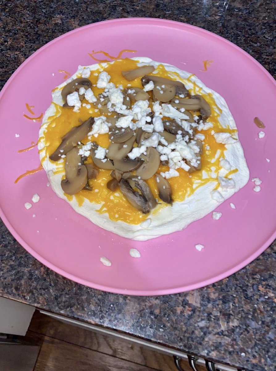 This is basically the best breakfast ever! I took Egglife egg white wraps and topped it with cheese, mushroom & some feta! 10/10 would recommend!