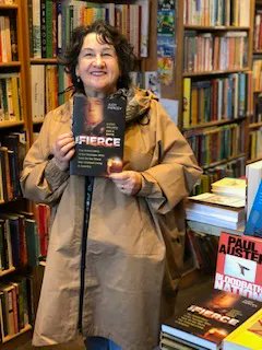 Spotted in <a href="/PHBookshop/">Primrose Hill Books</a> 📍 Our lovely author Judy Piercey with a copy of her book 'The Fierce.' The fascinating story of the teenager who helped take down the worst mass murderer and war criminal in #America. Order your copy now: bit.ly/3Snnuiw #WWII #Holocaust