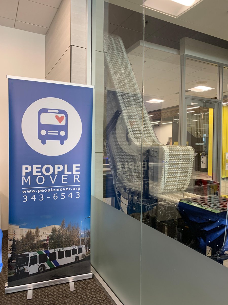 ancpeoplemover's tweet image. Library pop-up! 
We’re here at the Loussac Library until 4pm chatting it up about all things People Mover. Find us near this fun contraption! #bookdrop