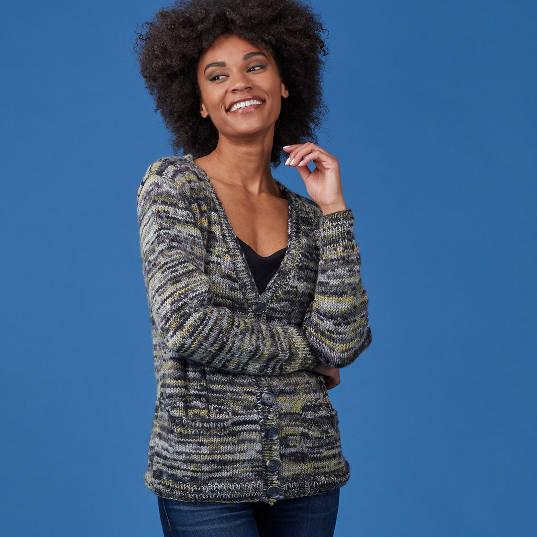 Tahki Yarns Kaleidoscope adds a ton of visual interest to the simple design of the Basalt Cardigan. #knitting #knitlife #yarn #yarnlover
Get the pattern here -> bit.ly/TYBasalt