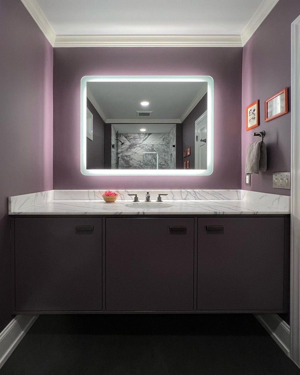 #Repost from @cabinet_creations_nc of this stunning bathroom remodel featuring our Eyla™ LED Lighted Mirror. Bring soothing tranquility to any space with the gentle curves and radiant wall glow of the Eyla™. bit.ly/3XZuzHi