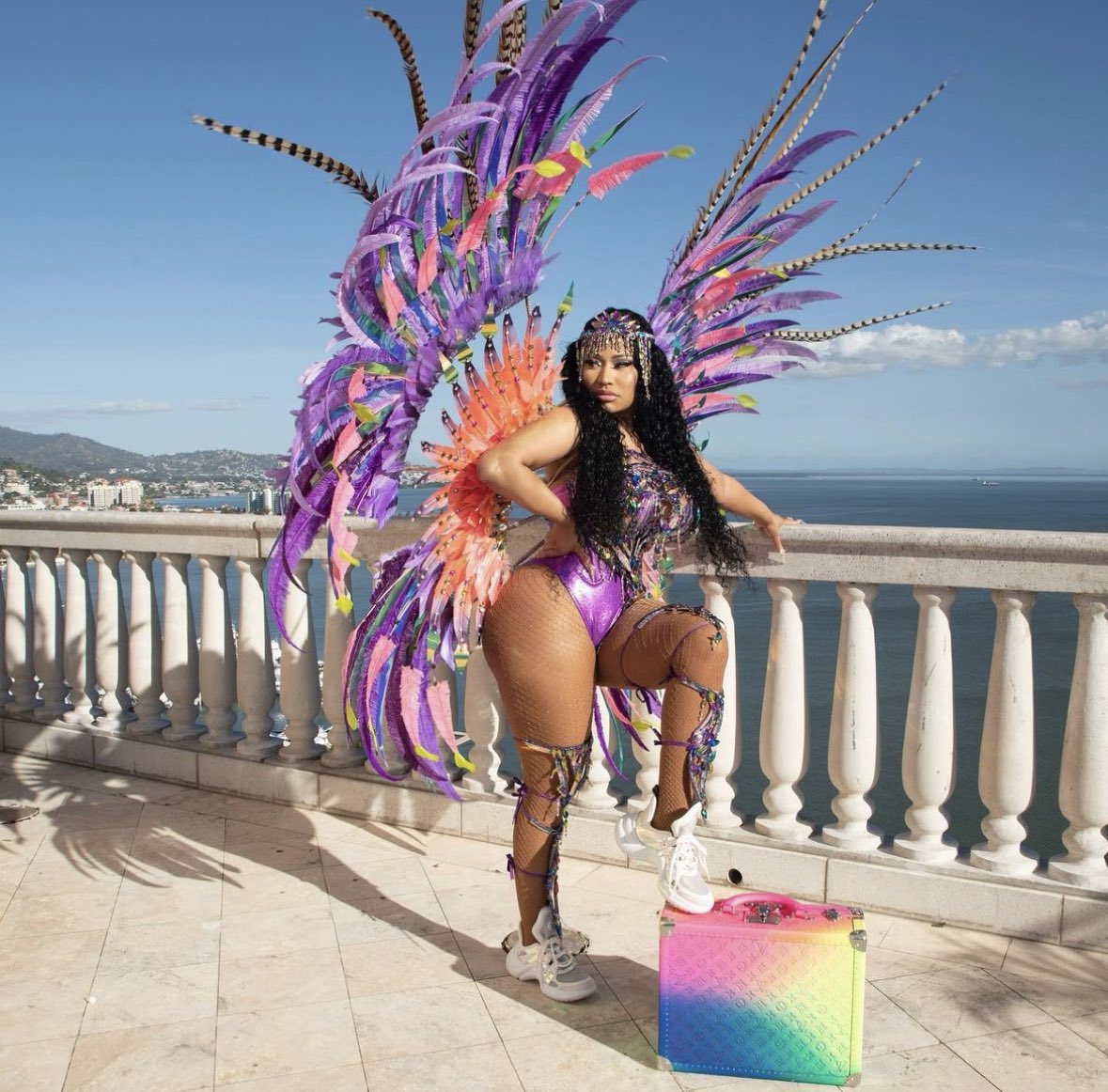 RT @PopCrave: .@NICKIMINAJ looks gorgeous posing next to her $26,000 Louis Vuitton bag ahead of Trinidad carnival. https://t.co/WIwPQoapEg