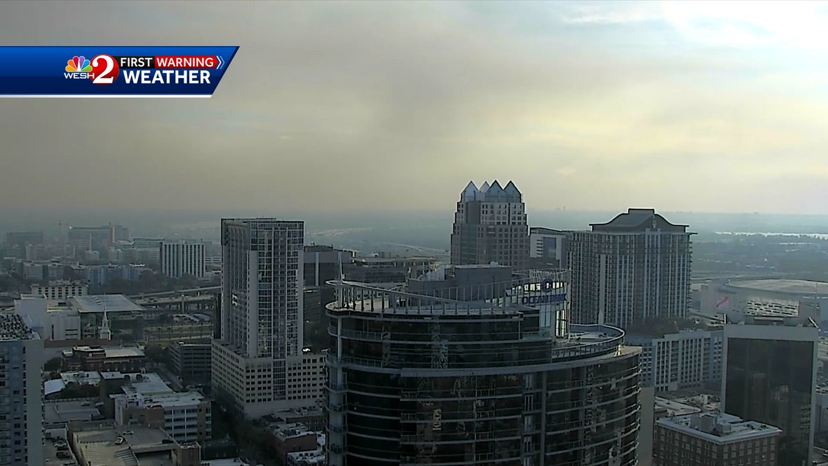 TMainolfiWESH's tweet image. Smoke from an 1,800 prescribed burn has moved into the attractions area and now downtown #Orlando. As winds subside tonight smoke will diminish. Stay with @WESH for updates. #weshwx