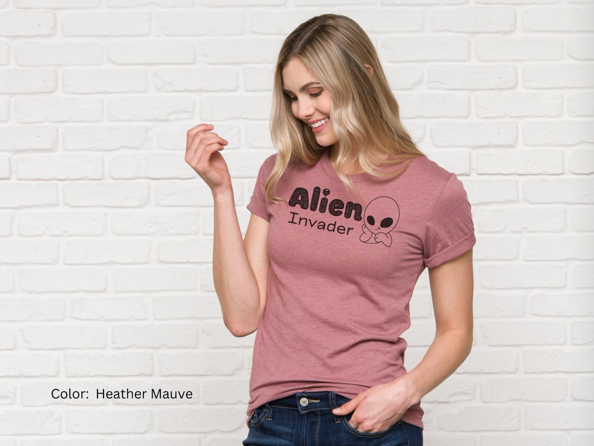 The cutest alien invader! New #UFO and #Alien shirts have arrived in my #etsy shop👽🛸Funny UFO Shirt Alien Invader Gift for Her etsy.me/3ZdWMv0 #cuteshirt #ufoabduction #funnytshirts  #flyingsaucer #iwanttobelieve #bestsellingshirts