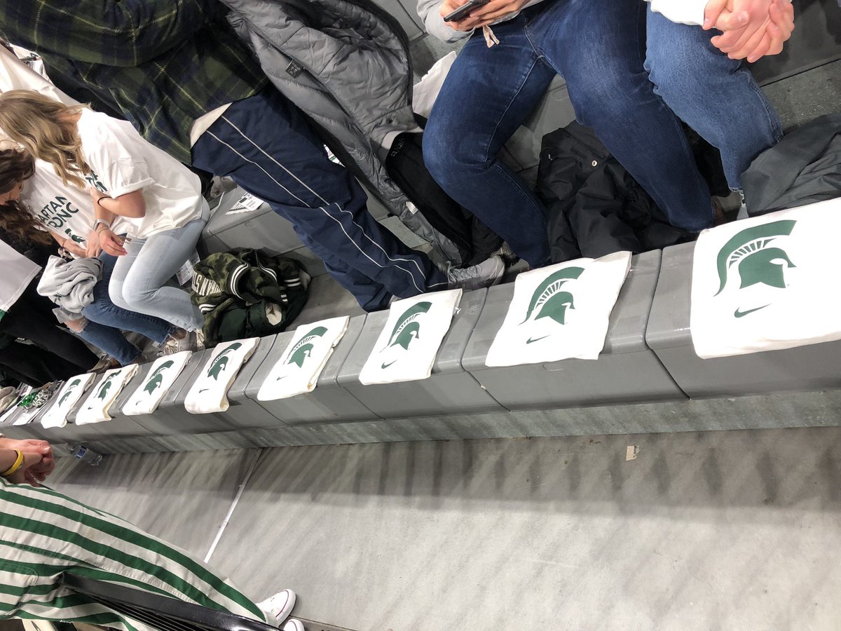 AudreyDahlgren's tweet photo. The eight seats in the @ThisistheIZZONE behind the scorer’s table reserved for the MSU students who either passed away or are still hospitalized. https://t.co/uAuRUgUXys