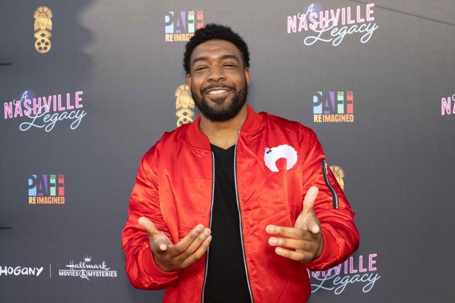 FistsUpAfrosOut's tweet photo. @GioJohnson_ in his red bomber on the red carpet 💥 https://t.co/Wuy6q3sKCD