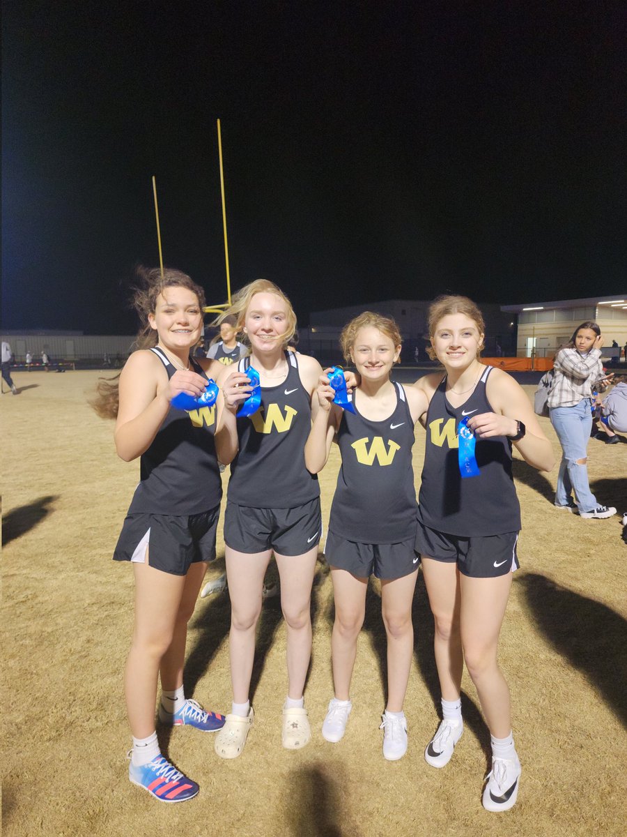 8th grade girls placed 1st in the 4x400m Relay.