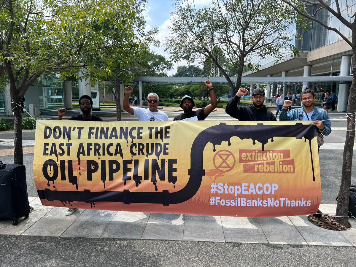 350Africa's tweet photo. People worldwide 🌍 are resisting @TotalEnergies  climate-wrecking East African Crude Oil Pipeline project. To ensure this, we must stop banks from funding #EACOP. Sign the letter demanding @StandardBankZA  SMBC and @StanChart to drop #EACOP ✍️https://t.co/HZd1coeQ1v https://t.co/tlAhoV5fAz