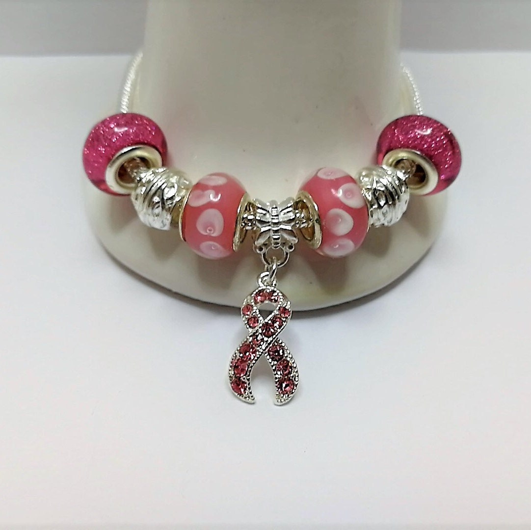 Voici ce que je viens d'ajouter dans ma #boutiqueetsy : Bracelet charm's, rose avec ruban rose et strass (réf 1016) etsy.me/3kkCykk #rose #oui #non #femmes #fermoirmousqueton #braceletcharm #braceletfantaisie #braceletfemme #rubanrose