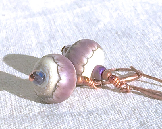 ZenCatPottery's tweet photo. Purple & Copper Earrings https://t.co/NrNXuOdRqW via @EtsySocial #zencatpottery #etsysocial #giftformom #forgirlfriend https://t.co/vgNwyjZPir