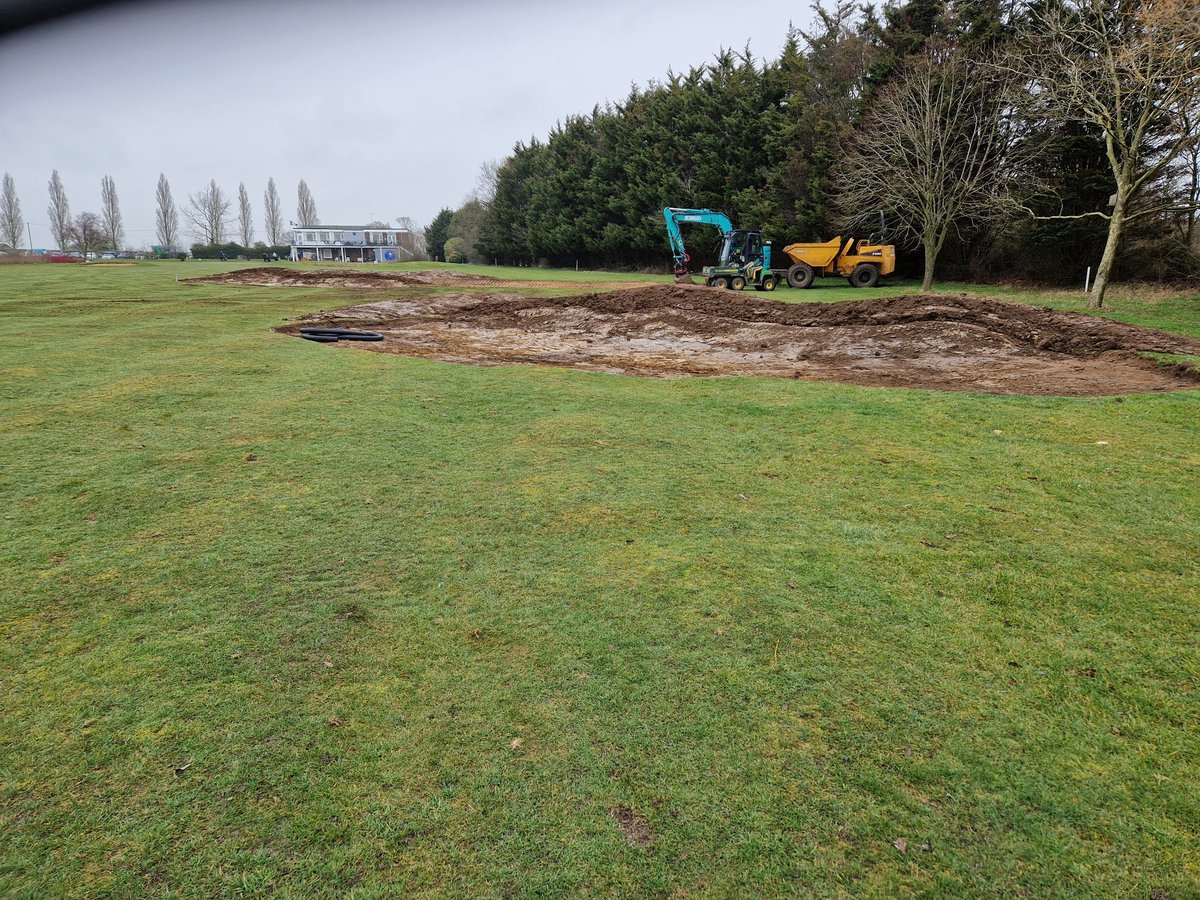 Too new fairway bunkers on the 18th 
Golf club too  turf and finish