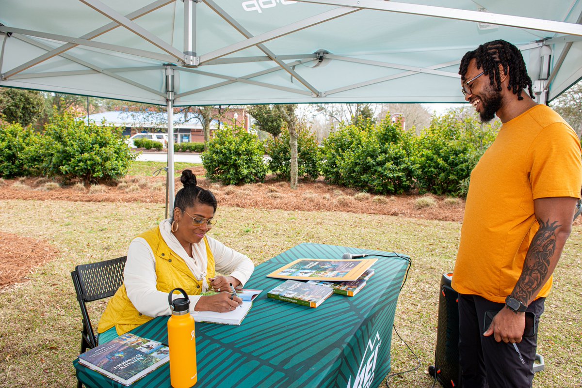 OutdoorAfroInc's tweet photo. Our Founder and CEO @RueMapp read from and signed copies of her new book, "Nature Swagger" AND also debuted her new co-branded hike collection with REI in the co-op's new Mount Pleasant store. Visit this fun location and shop our apparel here: https://t.co/YOzb4L2U4k https://t.co/BZLVAkjJKR