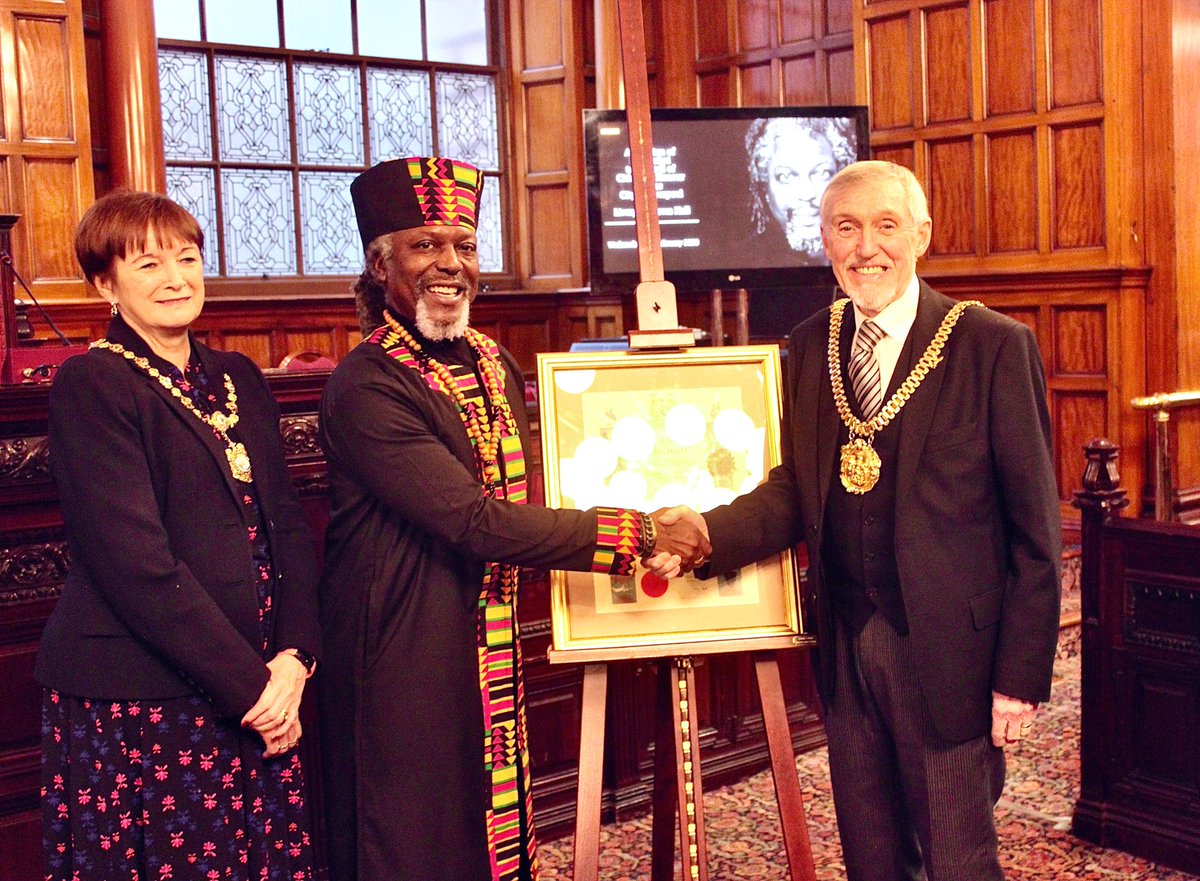 lpoolcouncil's tweet photo. @LeviTafariPoet has become Liverpool's latest Citizen of Honour. The popular performance poet was presented with the award by Lord Mayor Cllr Roy Gladden during a ceremony at the Town Hall this evening #LeviTafari #CitizenOfHonour #poetry https://t.co/k5v6uXGahU