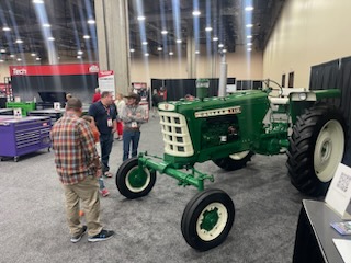 ChevronTRC's tweet photo. Last week our 2022 #ChevronTRC Grand Champion, Ethan Van Delden, was invited to display his tractor at the Mac Tools Fair in Dallas. Ethan said, "The 2023 Mac Tool Fair was fun!  I loved talking to all the people &amp; hearing stories about how they grew up driving an Oliver 770." https://t.co/AQIOd2nfOD