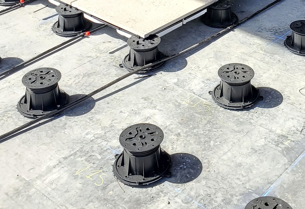 Buzonpedestals's tweet photo. This Buzon pedestal paver installation uses a Therma-HEXX snow melt system. This energy efficient system sends hydronic fluid to warm the pavers enough to prevent snow &amp; ice accumulation. #outdoorliving #buzonpedestals #decking #flooring #snowmeltsystem
https://t.co/BMTfaql5Uv https://t.co/p8ie994r0p