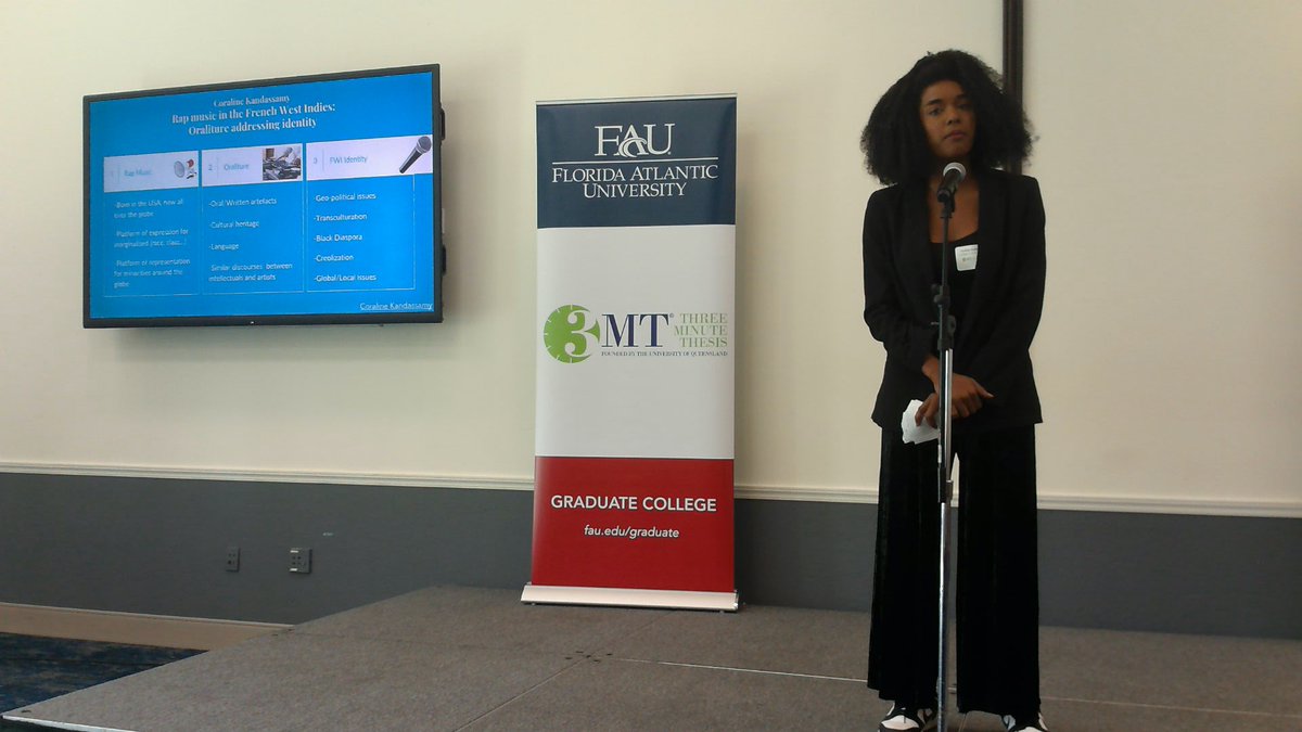 Coraline Kandassamy, graduate student from @FAUArtsLetters presenting “Rap Antillais: Oraliture and identity” #FAU3MT #3MT #ThreeMinuteThesis #ArtsandLetters #FAUGradCollege #research #scholarship