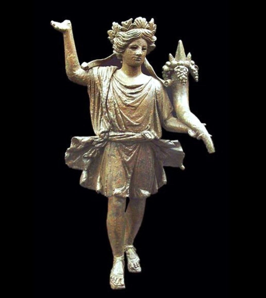 antinousgaygod's tweet photo. 🪷 22 Feb is the Roman #Caristia festival when Romans feasted with their nearest and dearest friends and family. They made offerings to the Lares household guardian spirits to ward off enemies and evil spirits for another year. Art: one of the Roman #Lares house spirits. 🪷 https://t.co/dClTOUsvgD