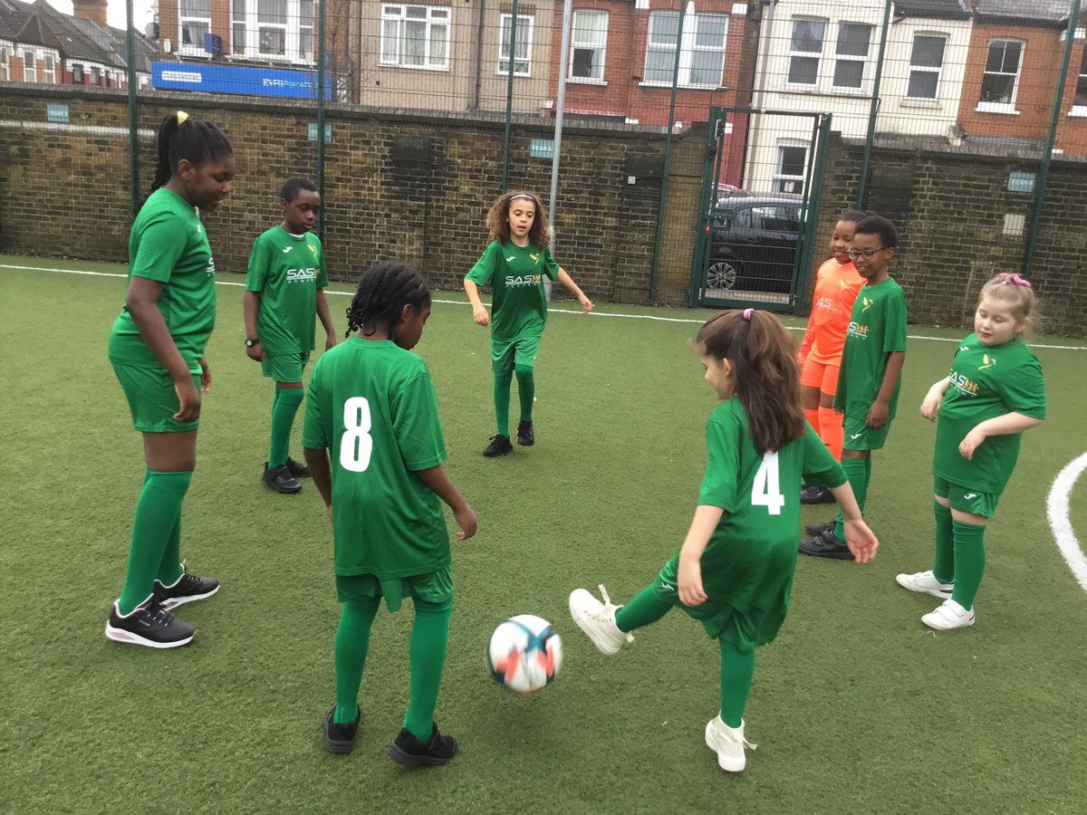 GoldfinchPrmry's tweet photo. Coach Ben has treated us to a brand new football kit! We are so grateful and can’t wait to show it off at our next tournament. ⚽️⚽️⚽️ Thank you for your kindness 💛💚 #sasacademy https://t.co/UnGGk61WKu