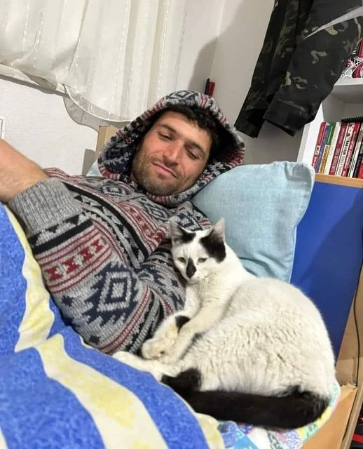 A cat saved from the earthquake rubble in Turkey refused to leave his rescuer's side. The rescuer, Ali Cakas, adopted the cat and named him "Enkaz," rubble in Turkish! 
Here's to a long and happy life to them both! 😻