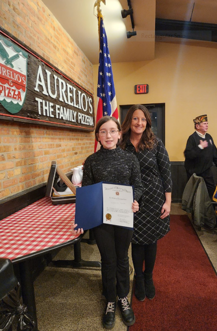 Homewood153's tweet photo. Congratulations to 6th-grader, Natalie Popelka! Her VFW Patriot’s Pen Contest essay, “My Pledge to Our Veterans,” won an award from Homewood VFW Post 8077. Her award was presented Monday night at Aurelio’s. Way to go, Natalie! #153Proud https://t.co/dM8jsqUAxR