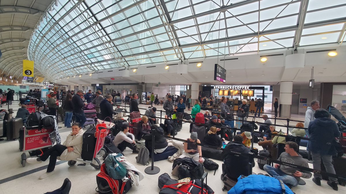 patrickheffron's tweet photo. @FlySwoop system is down. Flights left with very few onboard (anyone with baggage could get on). We arrived around 4:00 for a 6:40 flight. Over 4 hours in line for no reason. No plane. No one talking to anyone. It's like a sit-in with luggage. https://t.co/vsd3PsXBfS