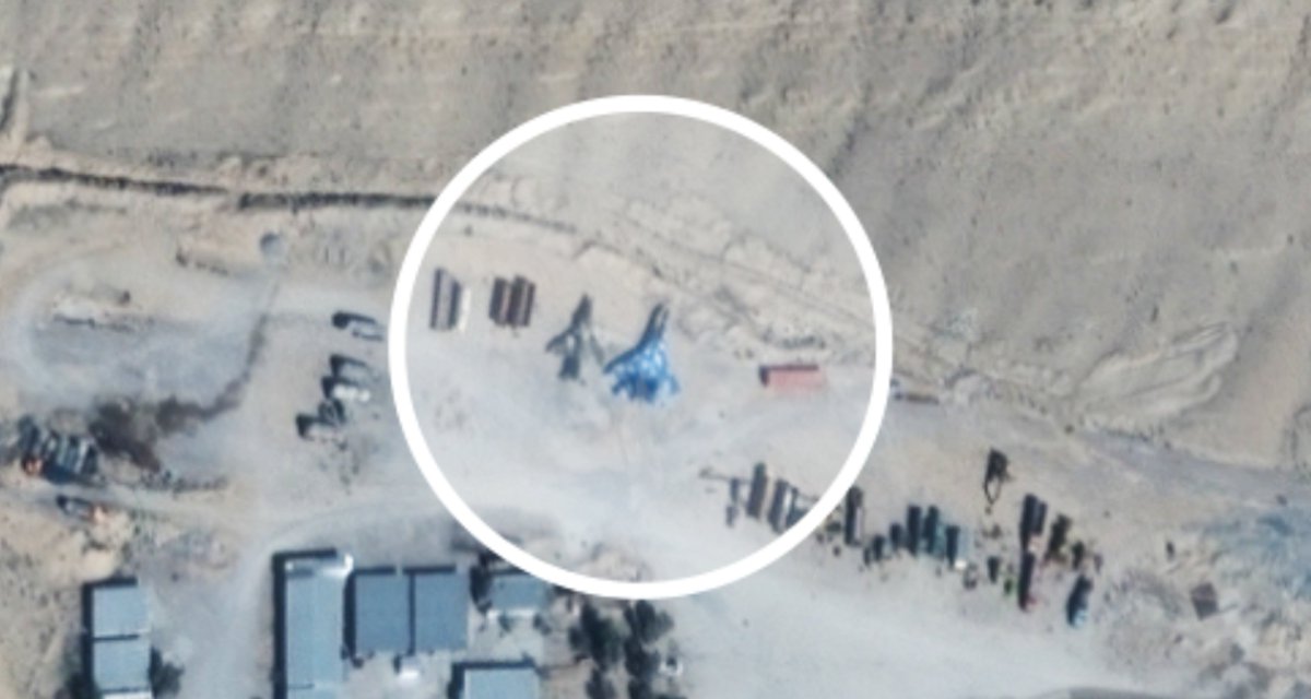 Satellite images show an Iranian Air base under construction, the aircraft seen in the image is suspected of being an Su-35 Flanker-E, some are saying its a mock up of the aircraft being used for sizing others think its the real thing being used for training, what do you think ?