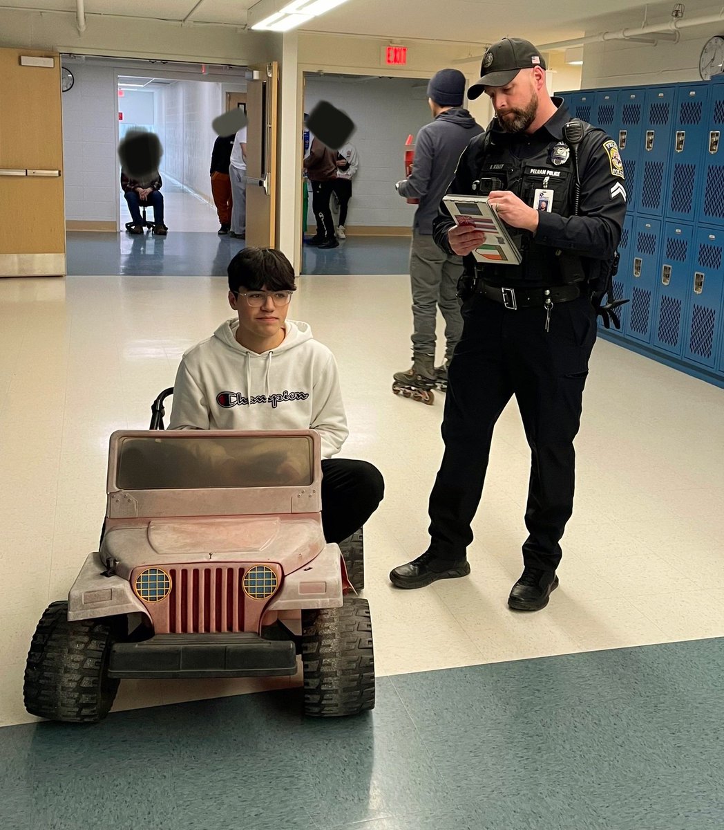 Corporal Kelly keeping our hallways safe on "Anything but a Backpack" #PythonPride #pelhamproud #today #spiritweek2023