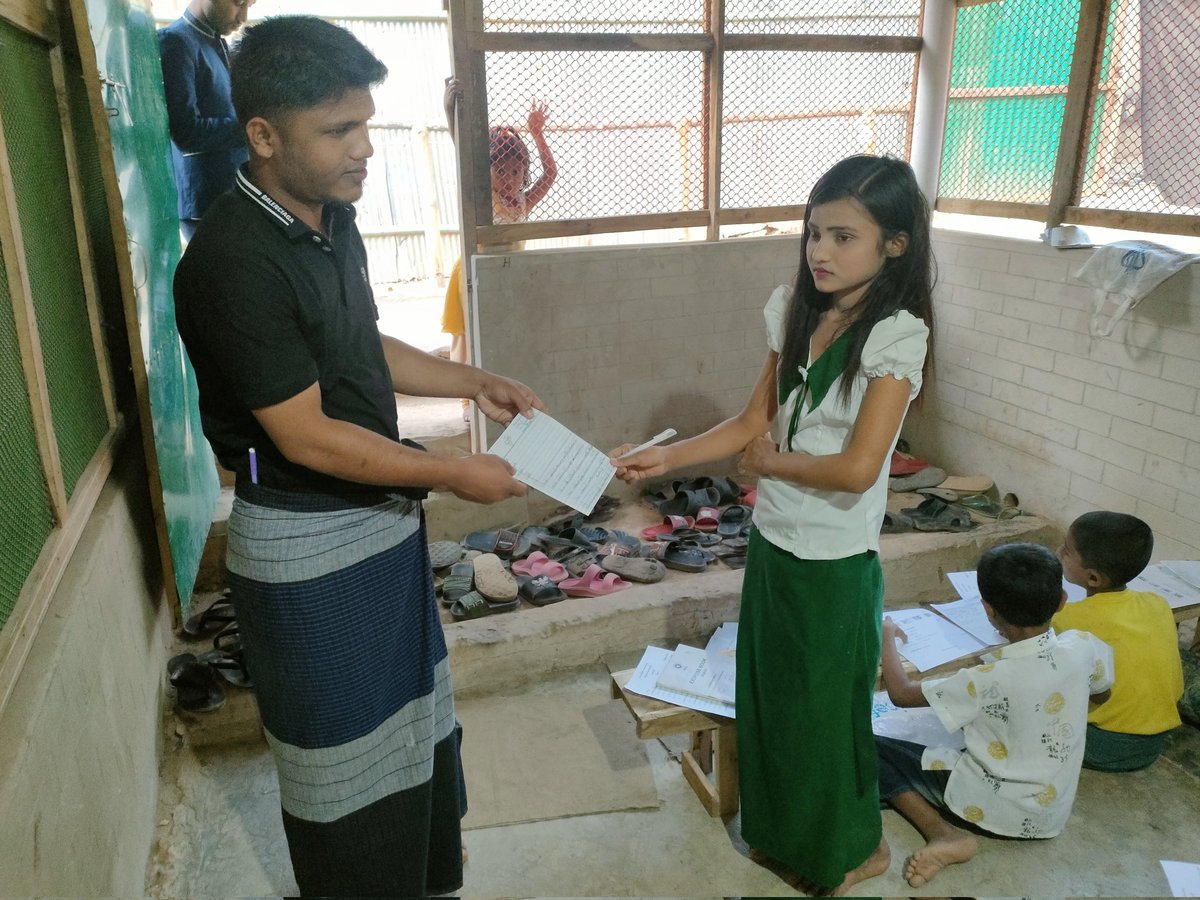 RoRiyazKhan's tweet photo. Today we take Final exam of Burmese Subject from class 1 to 3 at #powerofeducation Basic Education Middle School in Camp-16. Please everyone pray for to get high marks.
#education
#POE
#RohingyaStudent
#examPaper https://t.co/0NC2HTdRQj