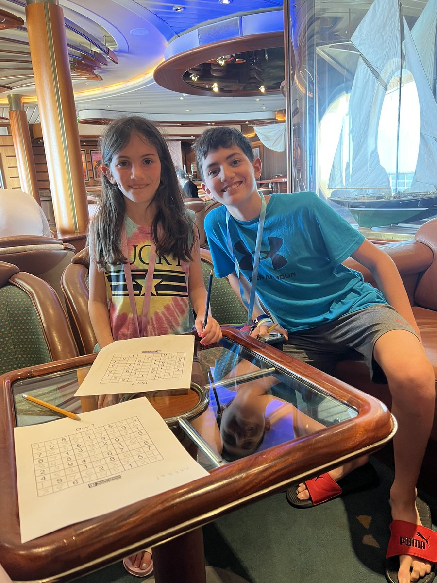 Doing some sudoku with my kids on vacation!  This family never stops doing math! ❤️