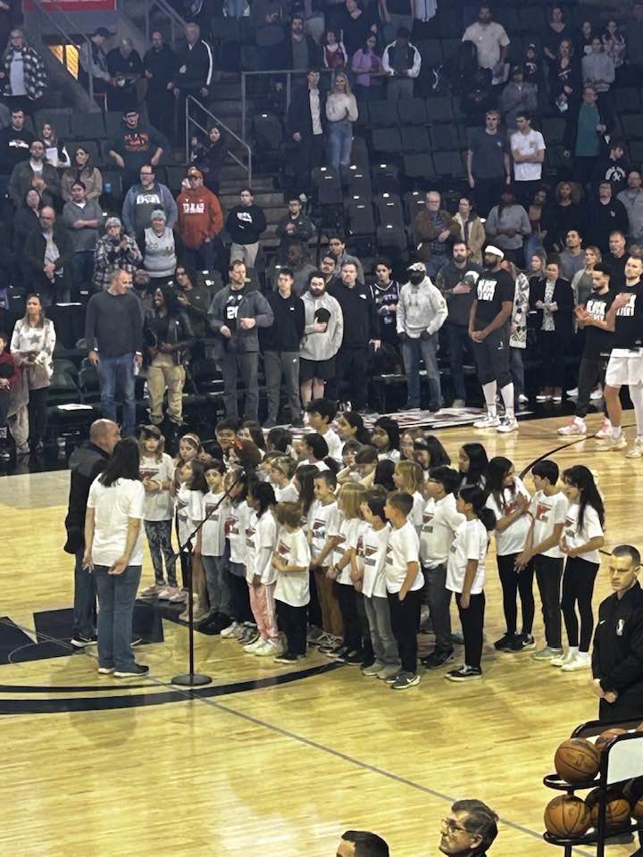 Travis Heights afterschool choir performing the National Anthem at the Austin Spurs Basketball Game. <a href="/THESThunderbird/">Travis Heights Elementary School</a>   <a href="/AustinspursXb1/">GLeagueAUSTINSPURS</a>.