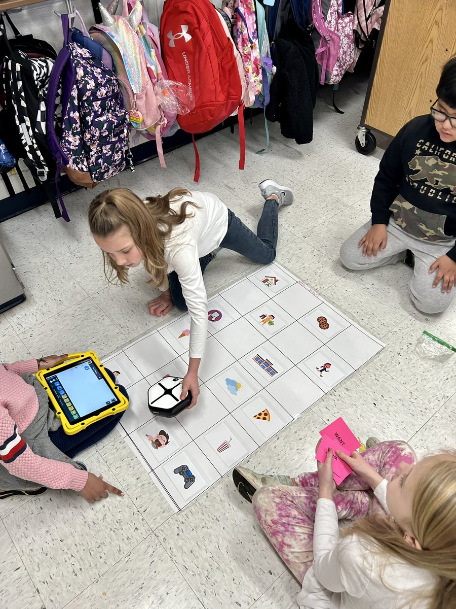 Computer Science Buddies helping us code! We incorporated Economics vocabulary as a review!