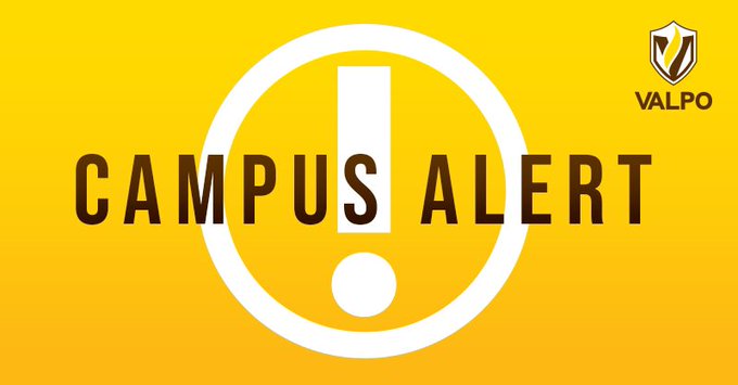 Yellow graphic with Valpo logo in top right corner, a white exclamation point in the center of the graphic, and CAMPUS ALERT written across the graphic in brown.