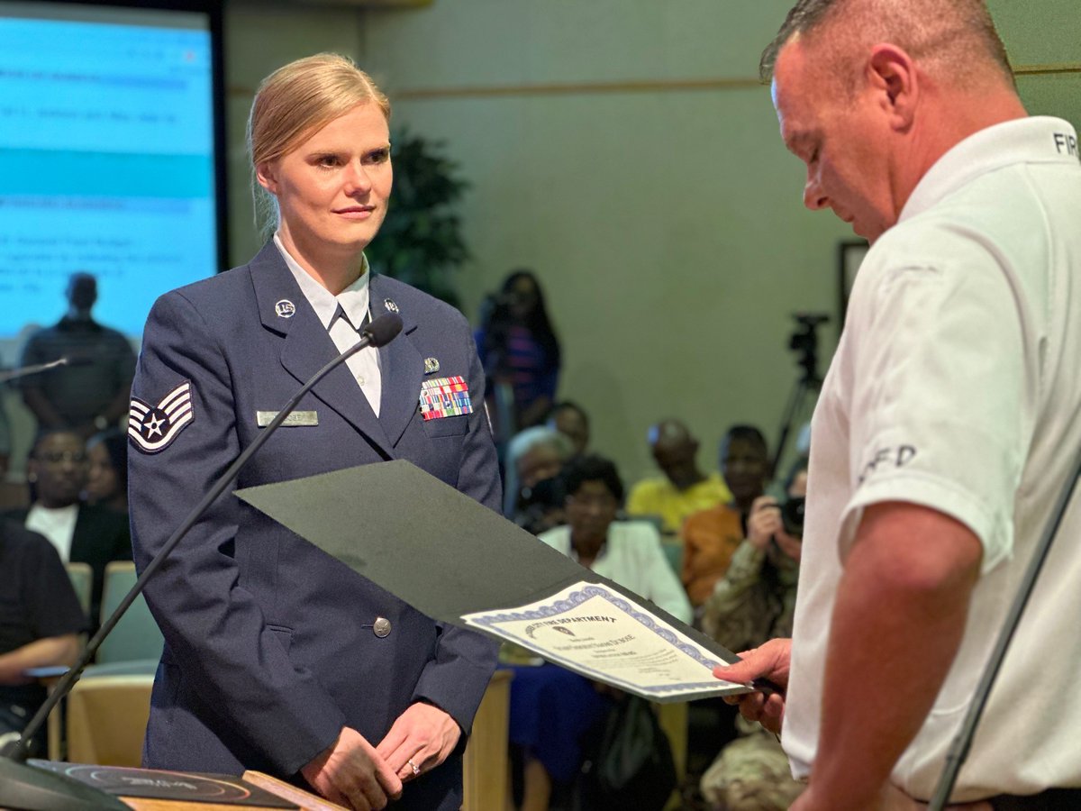 cityofbossier's tweet photo. SSgt. Naomi DuBose received the BCFD Appreciation Award at yesterday's City Council meeting for her bravery in helping a fellow motorist from a burning vehicle. Thank you for your swift actions! Read more here ➡️ https://t.co/h5DYw1kUYo https://t.co/XvxZSWiCx2