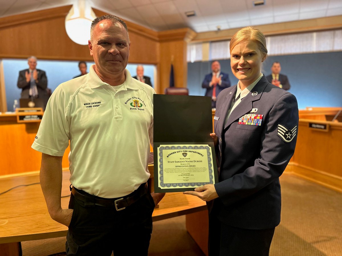 cityofbossier's tweet photo. SSgt. Naomi DuBose received the BCFD Appreciation Award at yesterday's City Council meeting for her bravery in helping a fellow motorist from a burning vehicle. Thank you for your swift actions! Read more here ➡️ https://t.co/h5DYw1kUYo https://t.co/XvxZSWiCx2