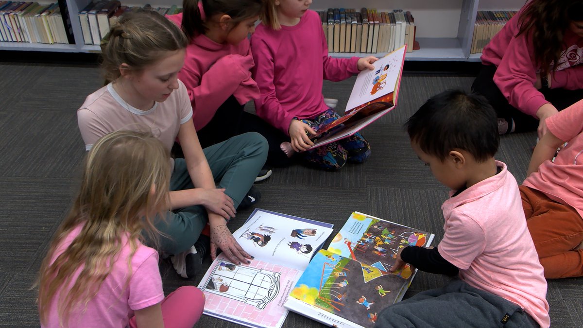 CFJC_Today's tweet photo. Kay Bingham students celebrate Pink Shirt Day by sharing books and kindness | WATCH: https://t.co/Svi6I9xmE3 https://t.co/vW9KxMu5je