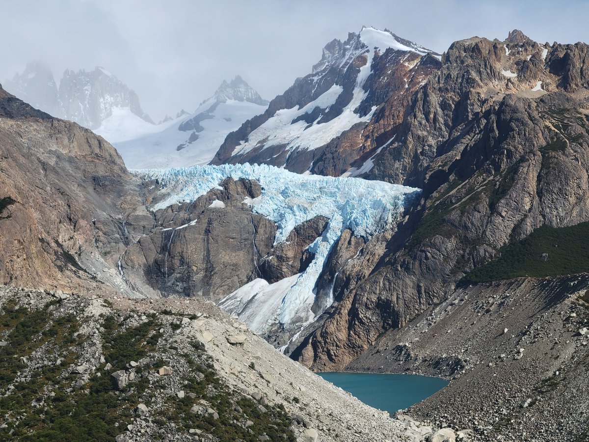 348fig's tweet photo. Today, we hiked the south side of Mt Fitz Roy. At the Piedras Blancas viewpoint we could see the glacier spilling down the mountain to a hidden lake. This was a 21k hike with multiple weather changes, but it was sunny at the viewpoint! https://t.co/JvewSixwEG