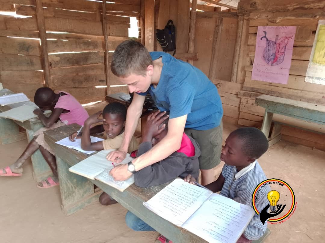 Class time with our Volunteer teacher.

office@ssamba.org
 ssamba.org

#ugandavolunteerprogram #volunteeruganda #volunteeringuganda #teachabroad #teachinuganda #teachenglish #teachgerman #teachspanish #ssambafoundation #mukonodistrict #languagevolunteers