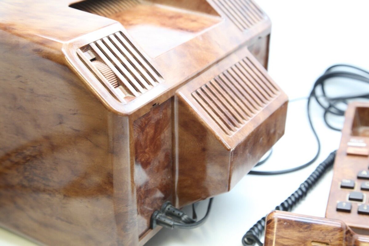 DefenceForceOrg's tweet photo. I keep being impressed by the variety of models of Minitels that existed during the golden era of the system.

That one is obviously designed  to go on the oak desk of the serious business executive, in glorious fake wood style! 🌳

https://t.co/3BIovOyXHs

#minitel https://t.co/cS1TVYtk3j
