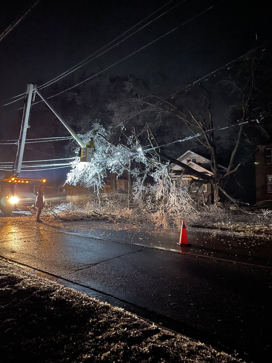 Firefighters cutting a tree off power lines at 3am. #ONStorm #IceStorm2023 #chathamkent