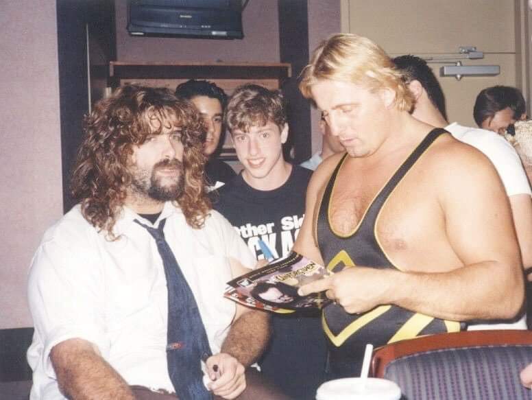 Great picture of Owen Hart signing an autograph for @RealMickFoley At least that's how I envision it.