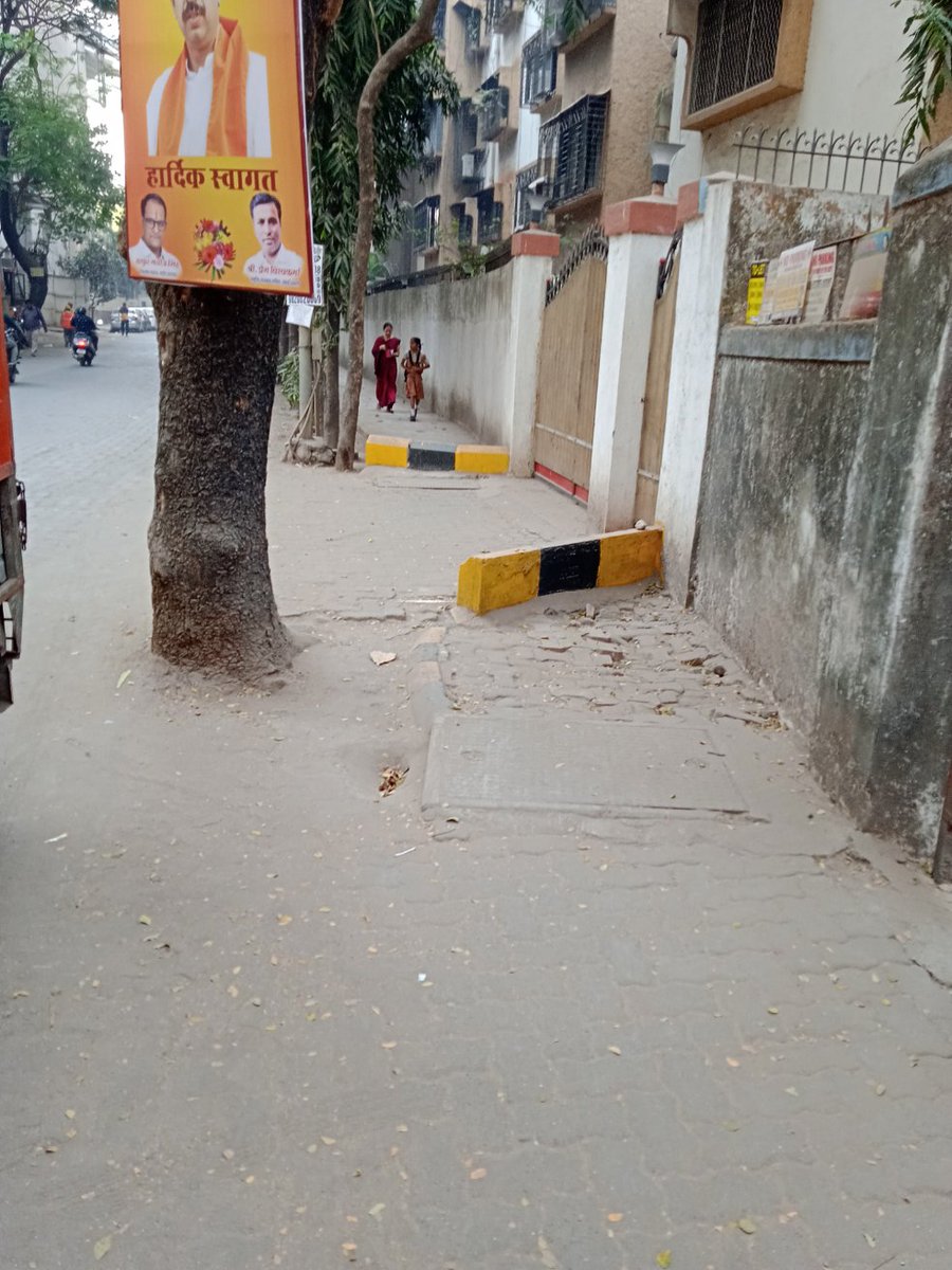 I_Concern_NGO's tweet photo. Can someone from the team of @mybmc or from @mybmcWardPS rectify or remove this from pavement. These are too big to cross smoothly for pedestrians.

Location - Nahar Niketan Building, Infront of Singh Industrial Estate No.3, Ram Mandir Road, Goregaon West 

@AndFootpath https://t.co/g3rX8ePP01