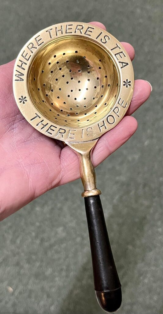 violetantiques's tweet photo. Fabulous vintage tea strainer from the 1960’s “Where there is tea there is hope” A perfect gift for the tea lover in your life! Made of brass with plastic handle. 
#vintage #teastrainer #brass #giftideas  #cupoftea https://t.co/YvlxkGRaus https://t.co/bPb3bR8KjL