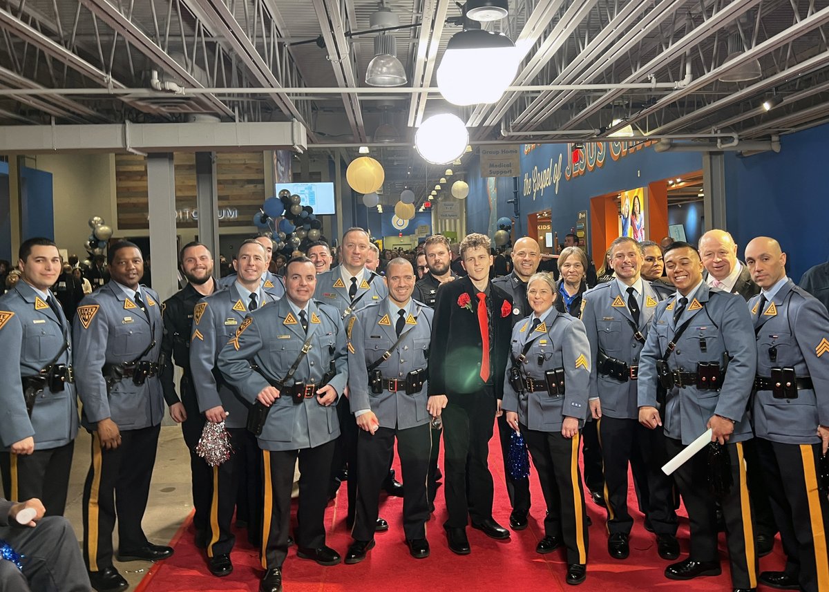 NJSP's tweet photo. On Friday, Troopers attended “Night to Shine” hosted by the Tim Tebow Foundation.  Night to Shine is a complimentary event for people with special needs hosted by local churches around the world. The event is open to anyone living with disabilities, ages 14 and older. https://t.co/qR2bbGwW7P