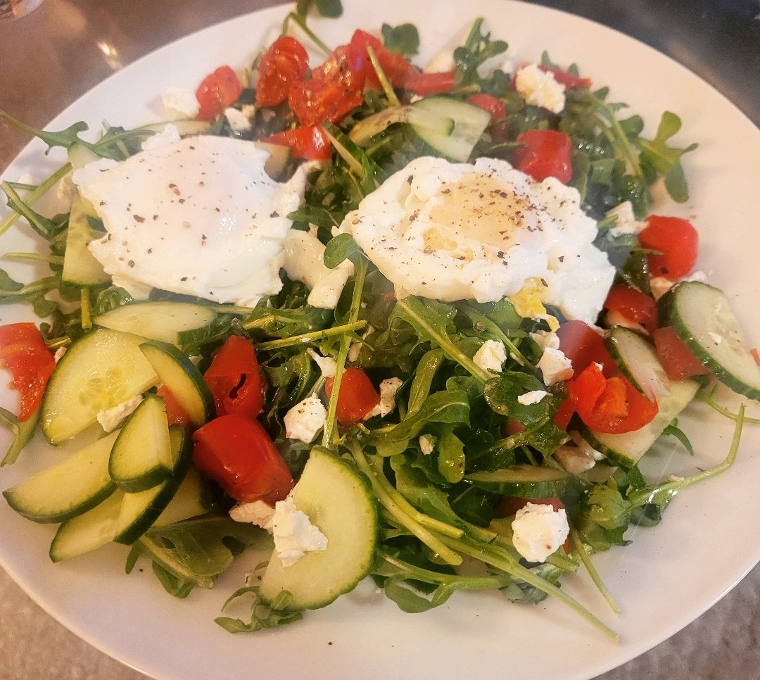 Poached Egg Salad 
#mediterraneandiet #arugula #tomatoes #Cucumber #fetacheese #lemon #evoo #foodie #lunchtime #lunchsalad #chefathome #homechef #healthyeats #goodeats